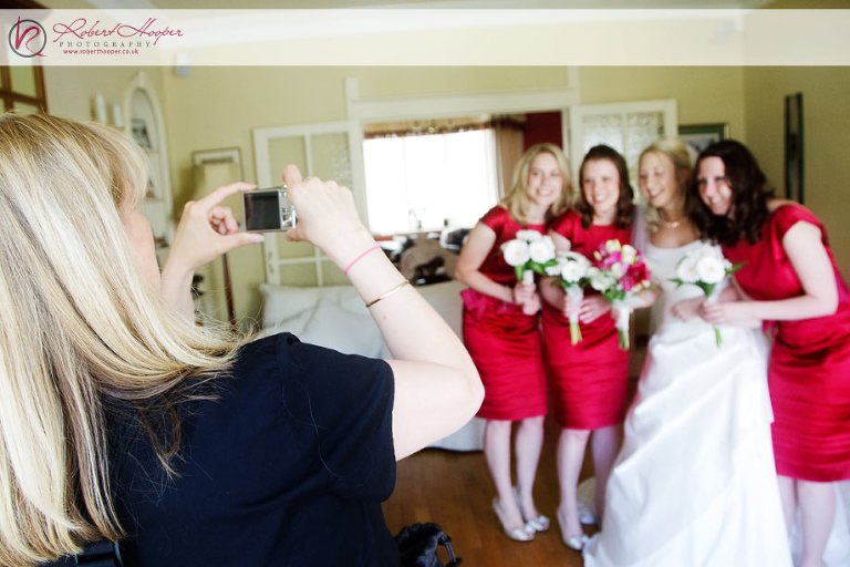 Karen steals a camera to get a shot for the girls... 
