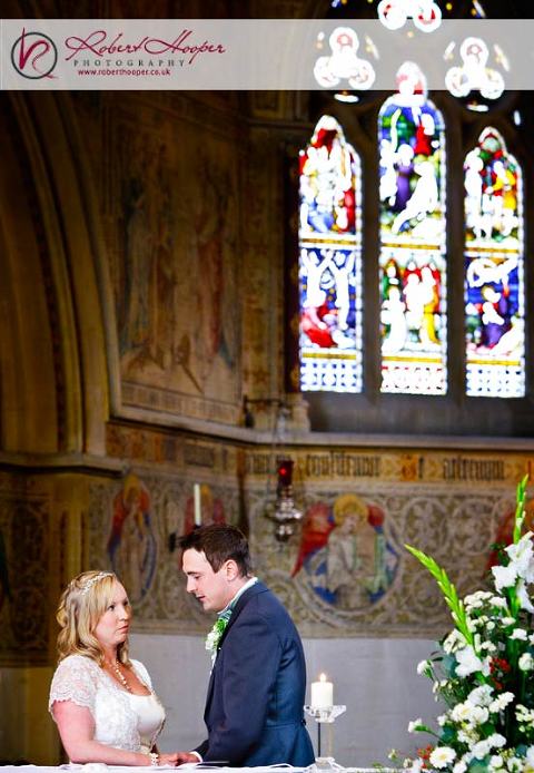 The wedding ceremony at Sacred Heart Church, Caterham on the hill 0909-HKLF-110