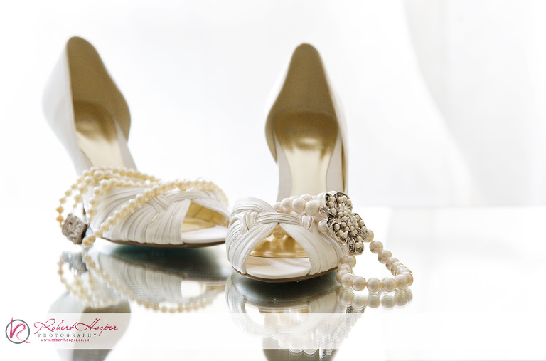 A quick shot of Sarah's wedding shoes and jewellery 0909-SDJH-0015