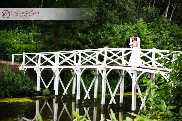 Bride and Groom on the Chinese Bridge at Painshill Park, Cobham