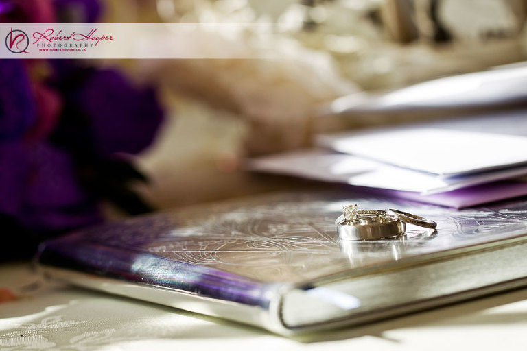 Wedding rings and guestbook photo 