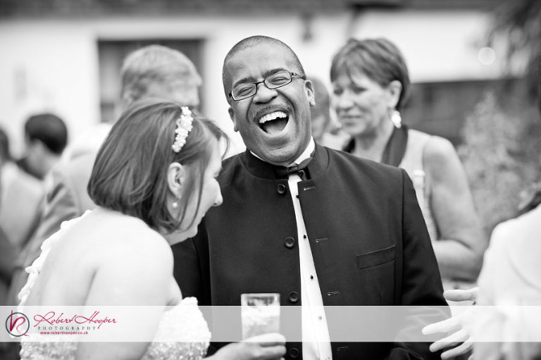 Wedding guests laughing 
