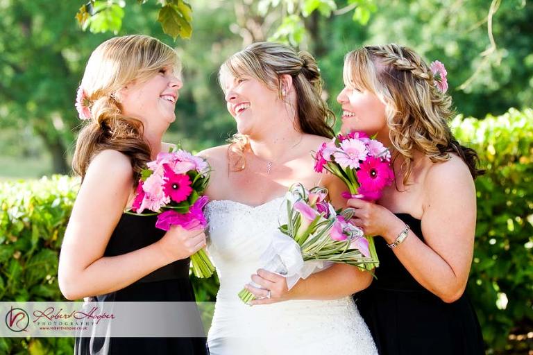 Bride and bridesmaids enjoying the fun 