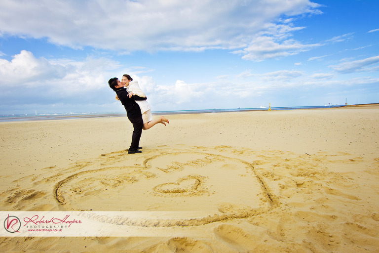 Fun pre wedding photography on the beach 