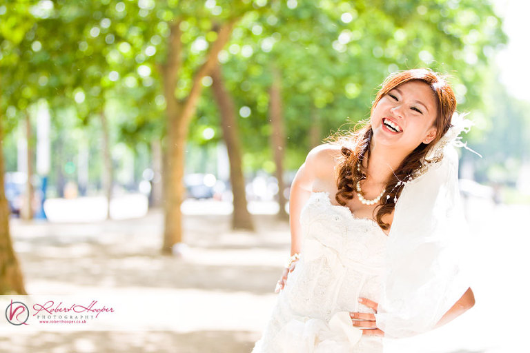 Laughing bride - fun pre wedding photography 
