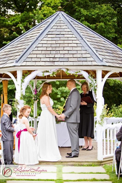 Outdoor wedding ceremony at Rowhill Gange hotel, Kent 