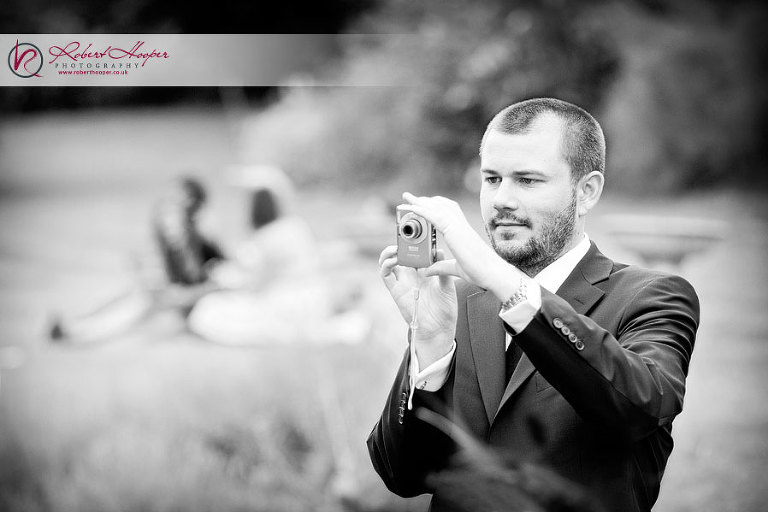 Guests with cameras at weddings in Kent 