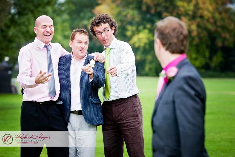 Groom's friends laughing 