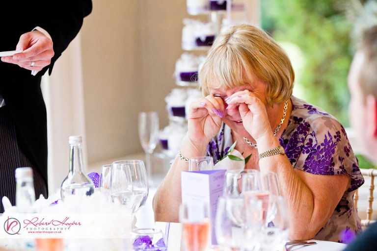 Mother of the bride tears of joy during wedding speeches 