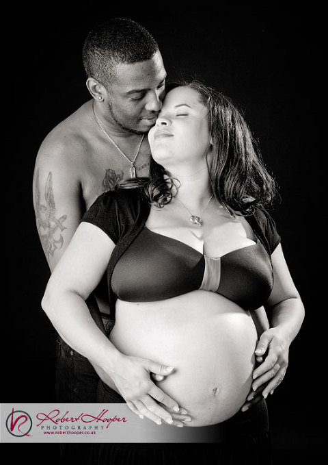 Maternity photos in low light studio 