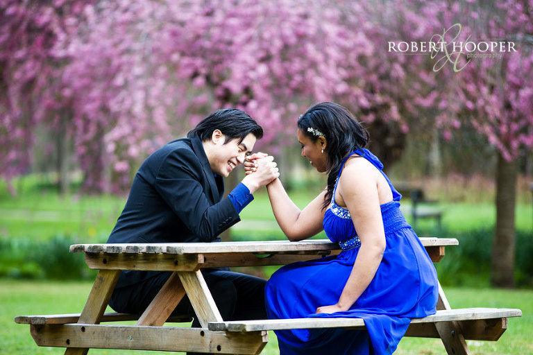 pre wedding photography fun - arm wrestling