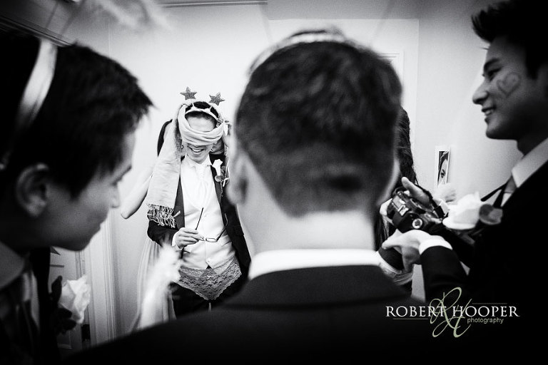 Chinese groom blindfolded during wedding door games challenges