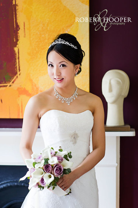 Chinese bride with bouquet on wedding day