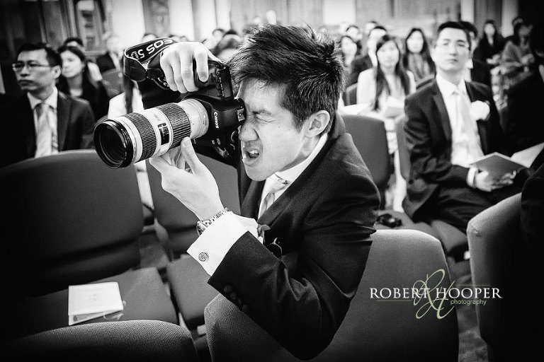Keen amateur photographer at church wedding ceremomy!