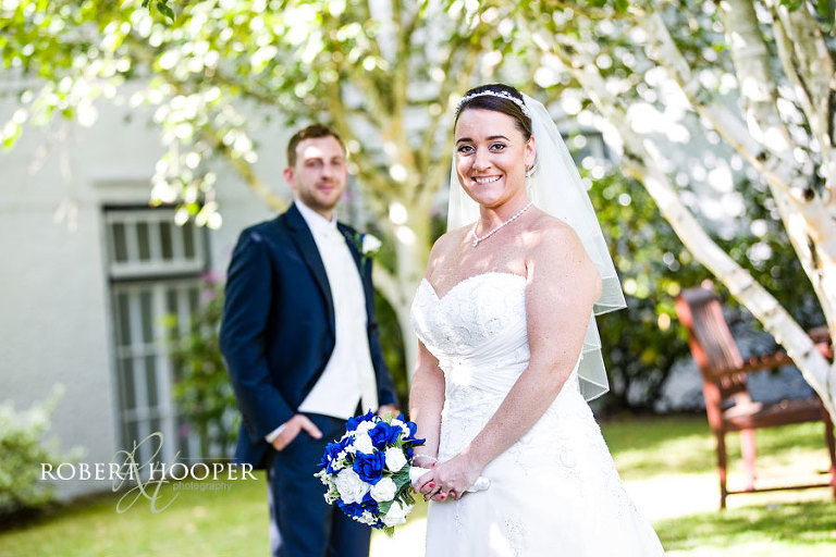 bride and groom at burford bridge wedding