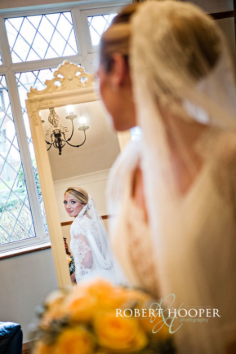 Kent bridal portraits photography, bride looking in mirror