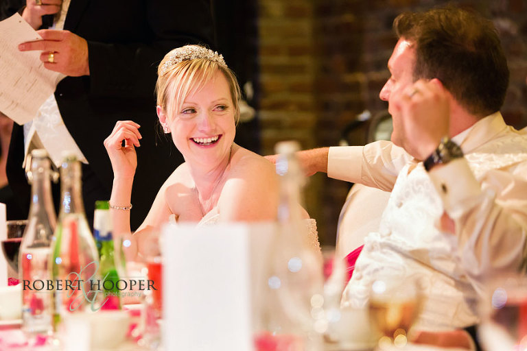 Wedding reception and speeches at Cooling Castle Barn in Rochester, Kent