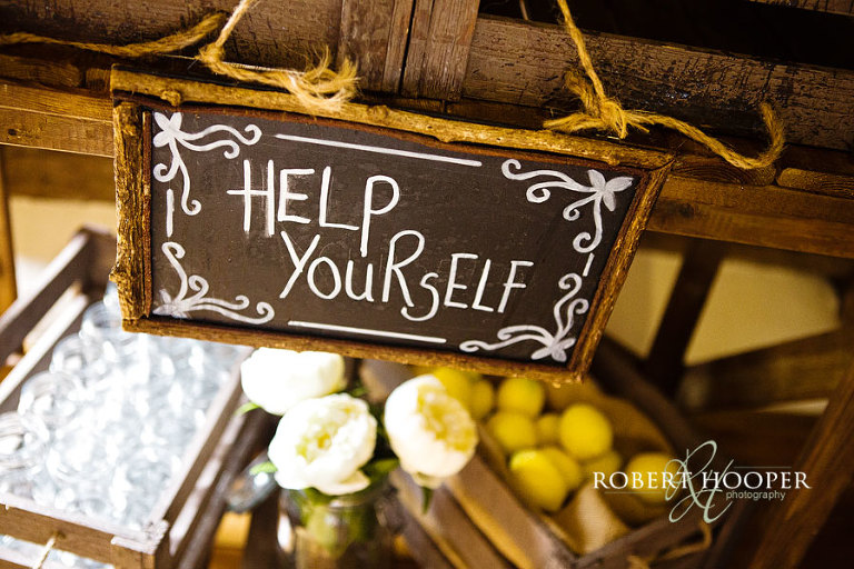 Documentary style photo of lemonade table at Cain Manor wedding venue Surrey