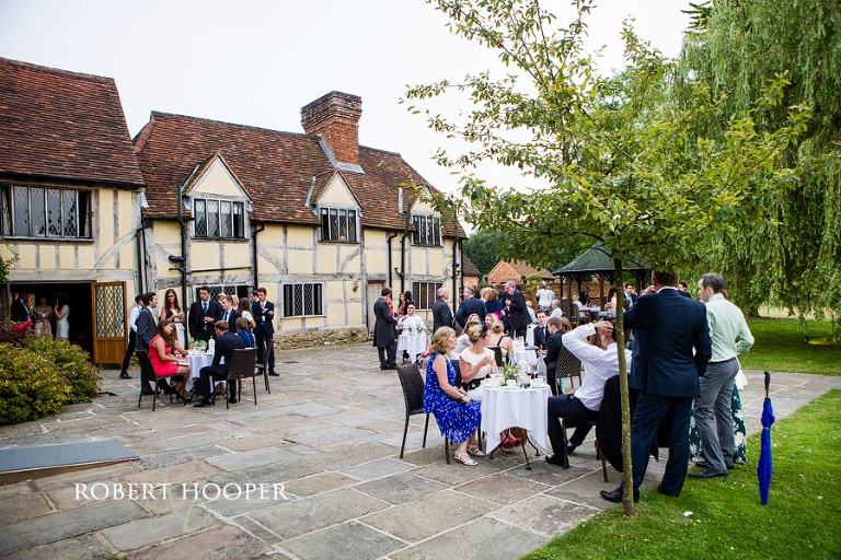 Guests at Bijou wedding at Cain Manor Elizabethan manor house Surrey
