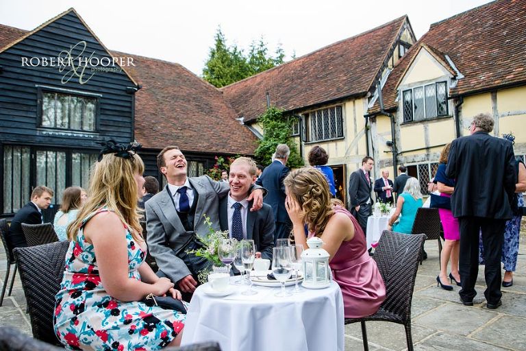 Guests having fun at Cain Manor Tudor Mansion wedding in Surrey