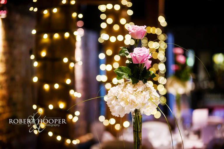 Wedding table flowers/decorations for wedding breakfast in Tithe Barn, Cooling Castle in Kent