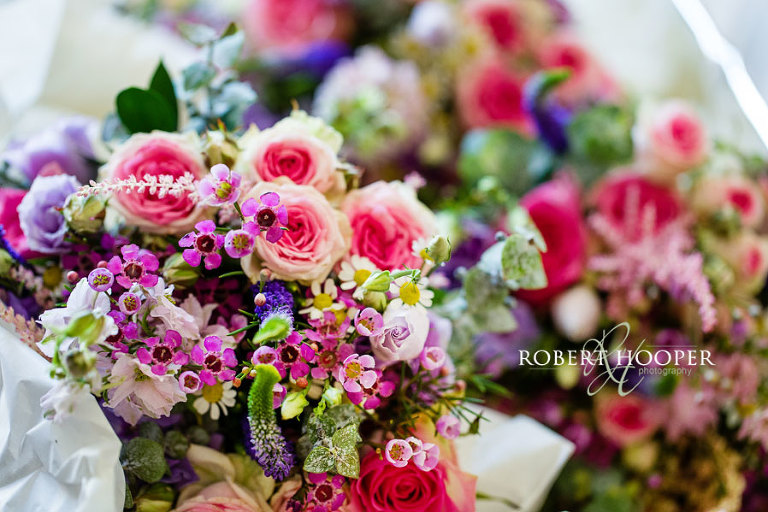 Beautiful wedding floral bouquet with pink roses for Kent wedding at All Saints Church in Orpington Kent