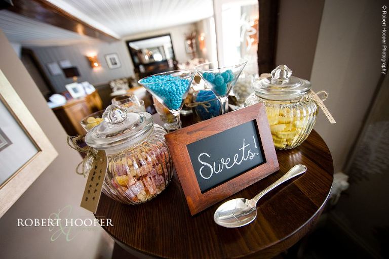 Sweet table at wedding reception at Stag on the River, Eashing in Surrey