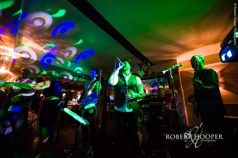 Live band play at evening wedding reception at The Stag on the River, Eashing in Surrey