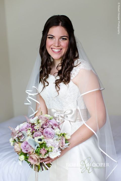 Bridal portrait just before leaving for Jewish wedding ceremony at Northbrook Park in Farnham, Surrey
