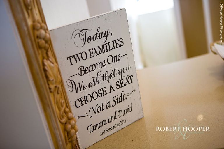 Wedding sign for guests regarding seating at their Jewish wedding ceremony at Northbrook Park in Surrey