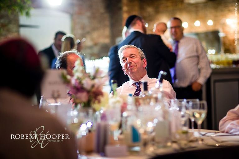 Wedding guests enjoying wedding breakfast at Northbrook Park in Surrey