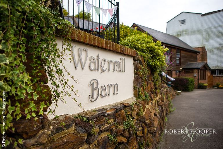 Coltsford Mill in Oxted, Surrey decorated with bunting for wedding day