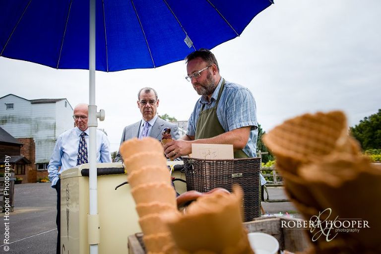 Ice cream vendor at wedding reception at Coltsford Mill, Oxted in Surrey