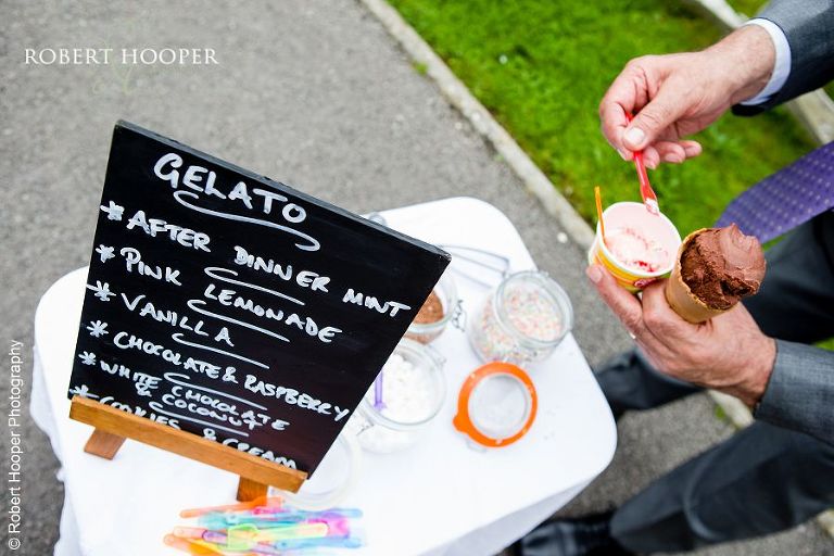 Ice cream trolley serving guests with Gelato at wedding reception at Coltsford Mill, Oxted in Surrey
