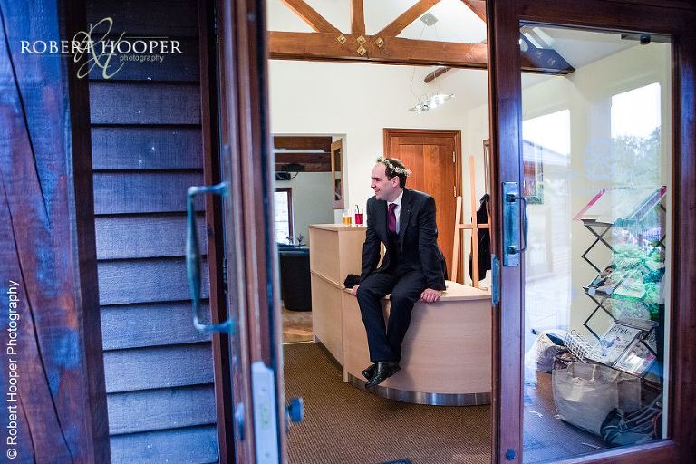 Guests wearing flower girls flower halo at wedding reception at Coltsford Mill, Oxted in Surrey