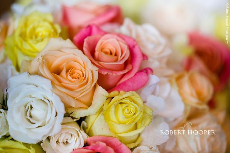 Pastel coloured roses for bride's bouquet on her wedding day at Botley's Mansion in Surrey