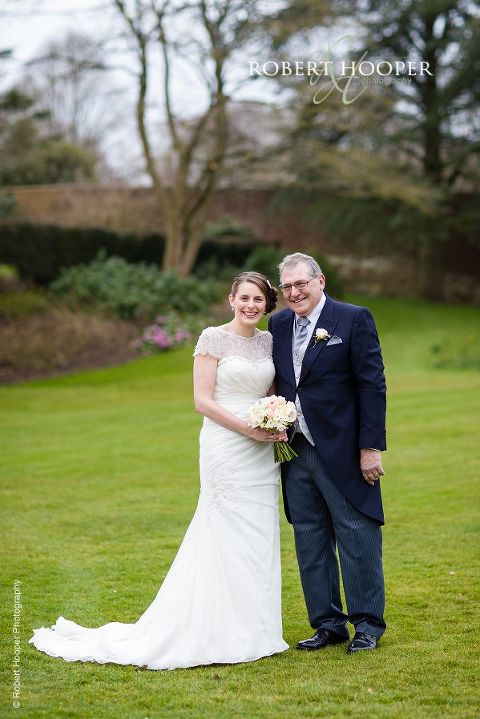 Bride and her dad just before wedding ceremony at St Anne's Church Surrey