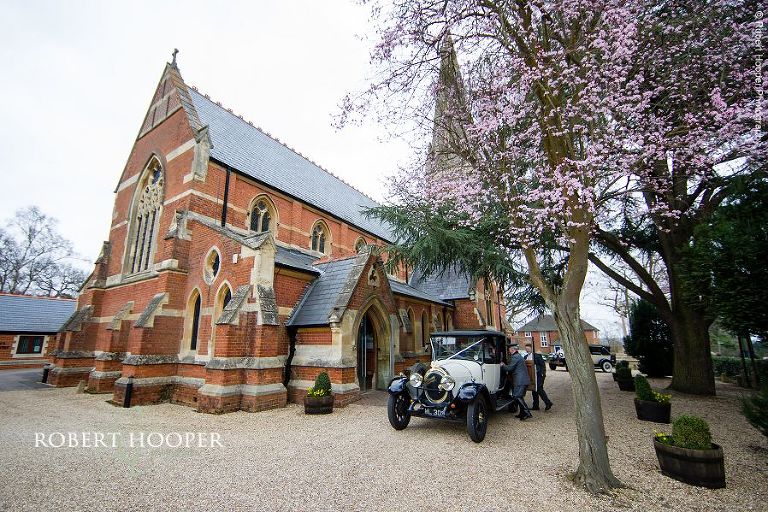 Vintage wedding car outside St. Anne's Church Surrey