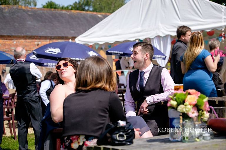 Wedding guests enjoying the sunshine and reception at The Three Tuns Bransgore, Dorset