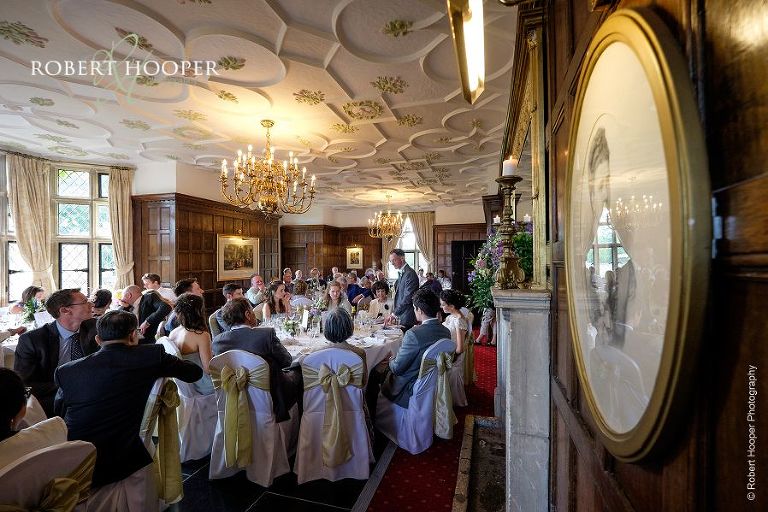 Father of the bride giving speech at wedding breakfast held at at Eastwell Manor Ashford Kent