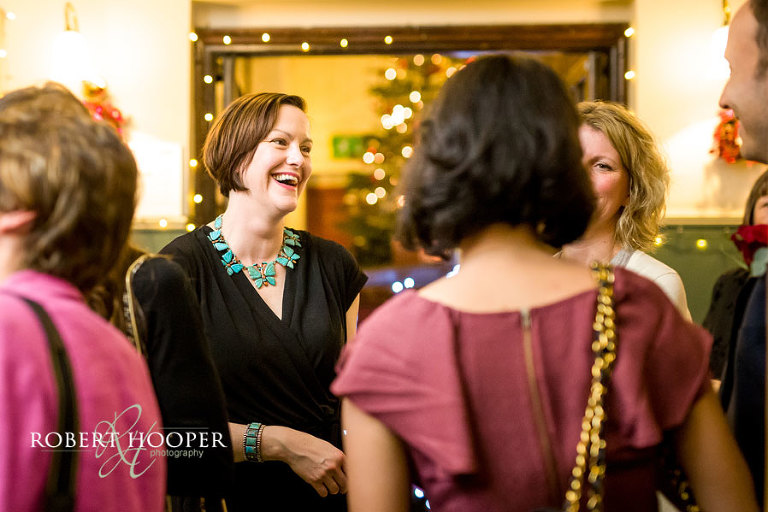 Wedding guests enjoying champagne reception at The Rooms at Browns London