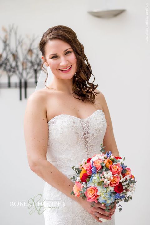 Bride ready to leave for the church on her wedding day at Bookham Baptist Church Surrey and Loseley Park, Guildford Surrey