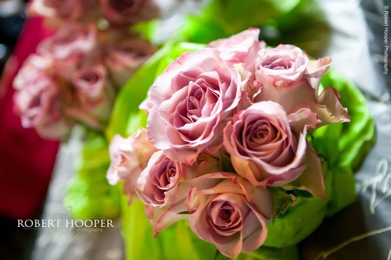 Bride's bouquet of pale pink roses for her wedding day at Chilston Park in Maidstone, Kent