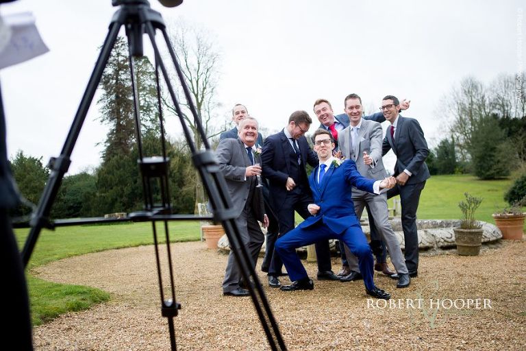 Groom and wedding guests sing for Marryoke at their wedding at Chilston Park in Kent