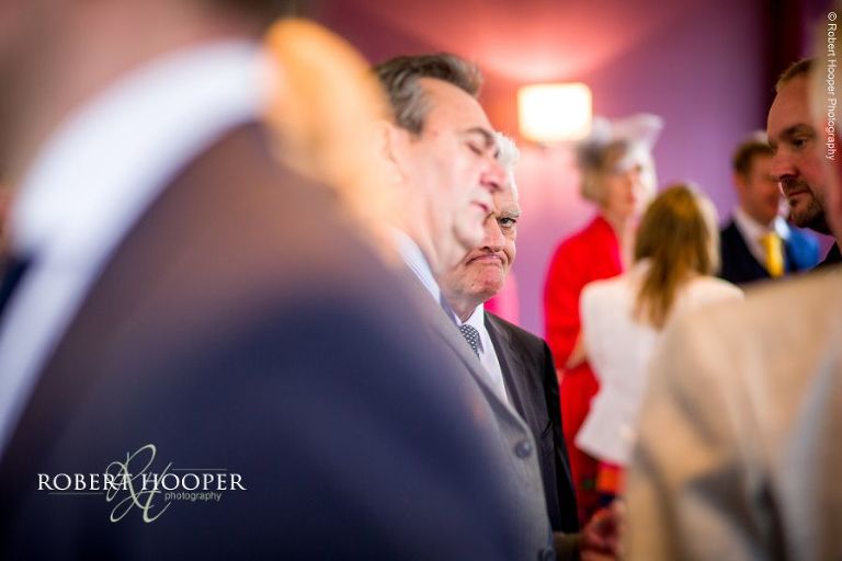 Wedding guests at drinks reception at Chilston Park in Maidstone Kent