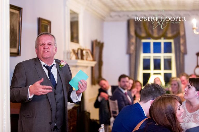 Father of the bride delivering his speech to at wedding breakfast in Culpeppers room at Chilston Park in Kent
