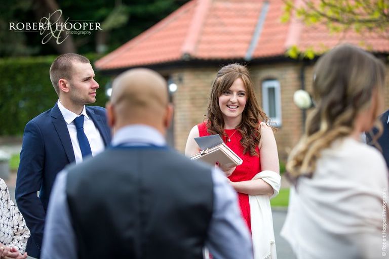Wedding guests arriving at Oaks Farm Barn Croydon Surrey for civil wedding ceremony