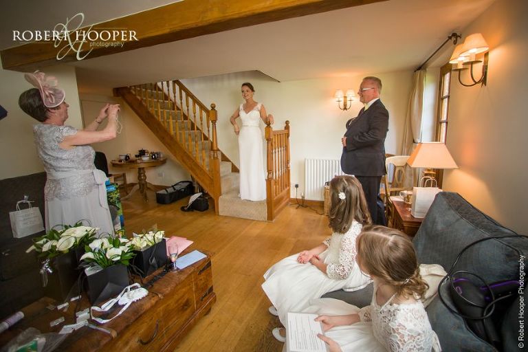 Bride ready to leave the cottage for her civil wedding ceremony at Oaks Farm Barn Shirley Surrey
