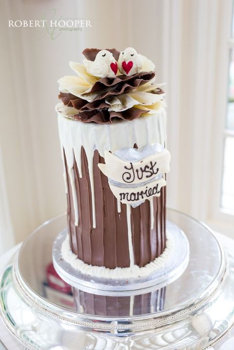 Choccywoccydoodah wedding cake for wedding day at Oaks Farm Barn Shirley Surrey