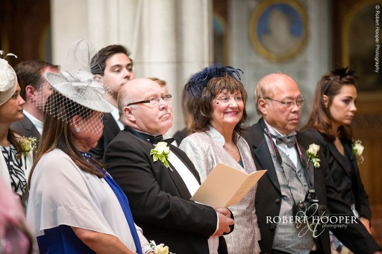 Wedding guests during marriage service at Sacred Heart Church Wimbledon